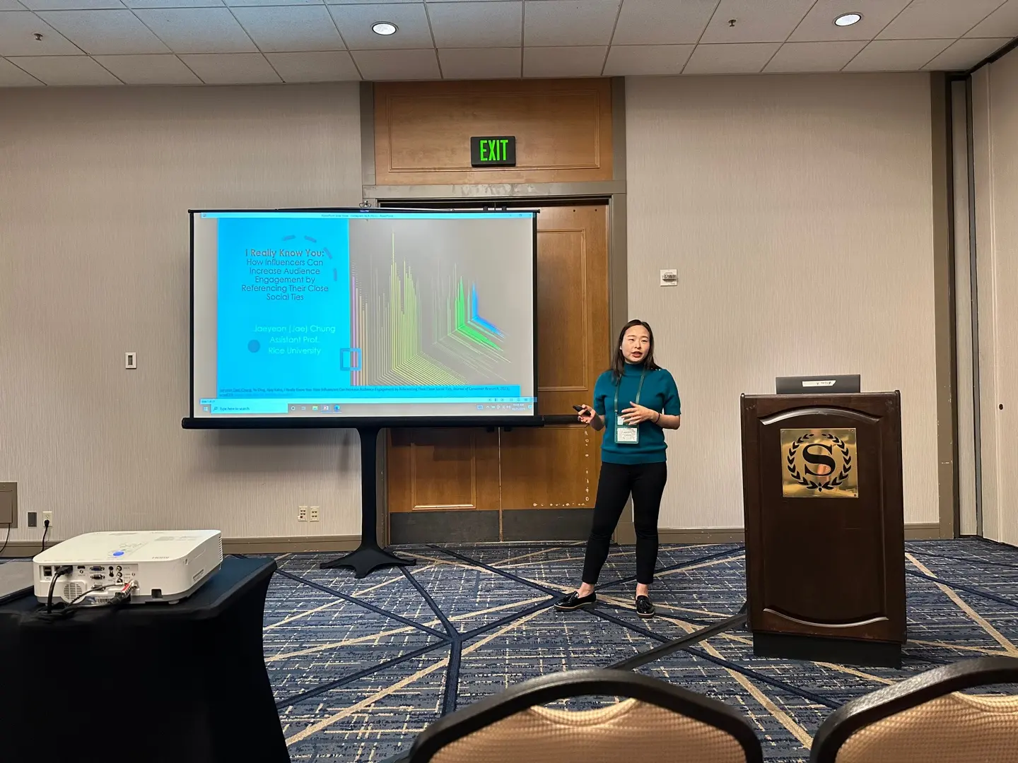 Jaeyeon Chung presenting research at an academic conference