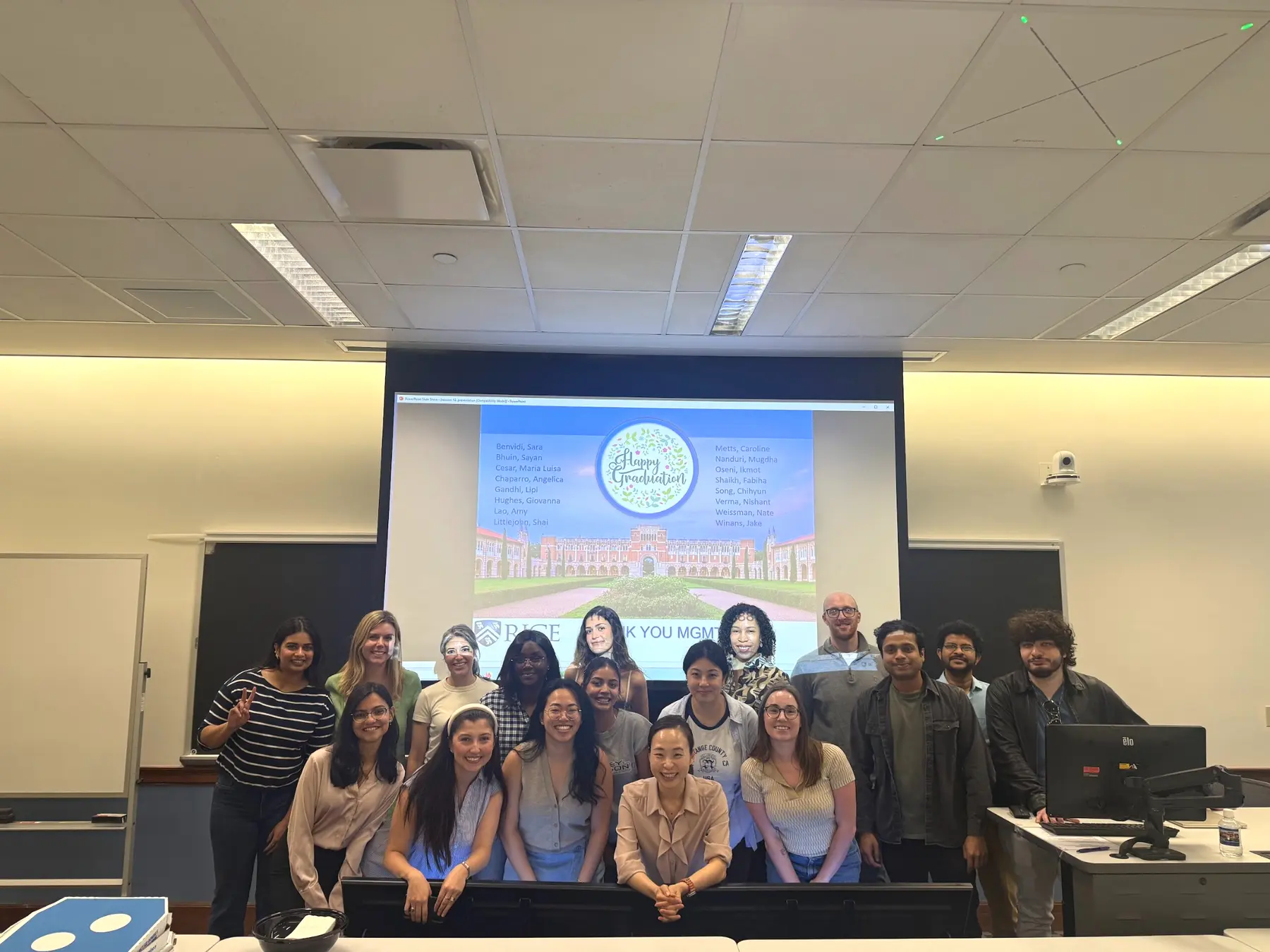 Jaeyeon Chung with MBA students in a Rice Business classroom